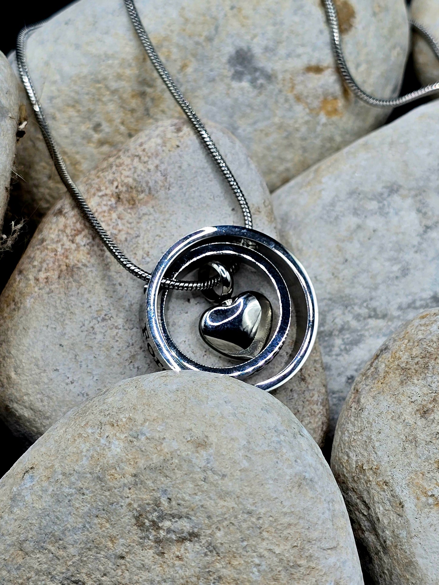 Stainless steel double circle with heart