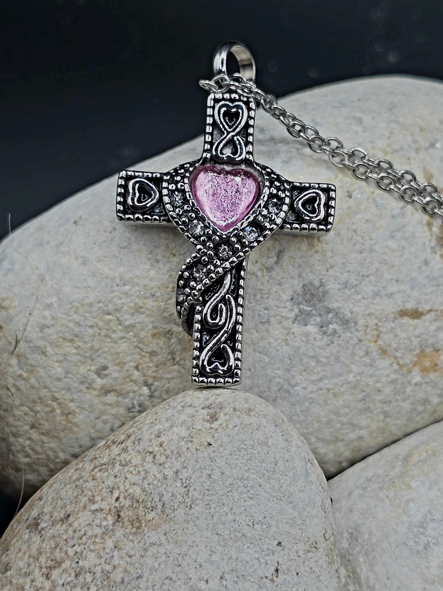 Stainless steel cross with purple stone