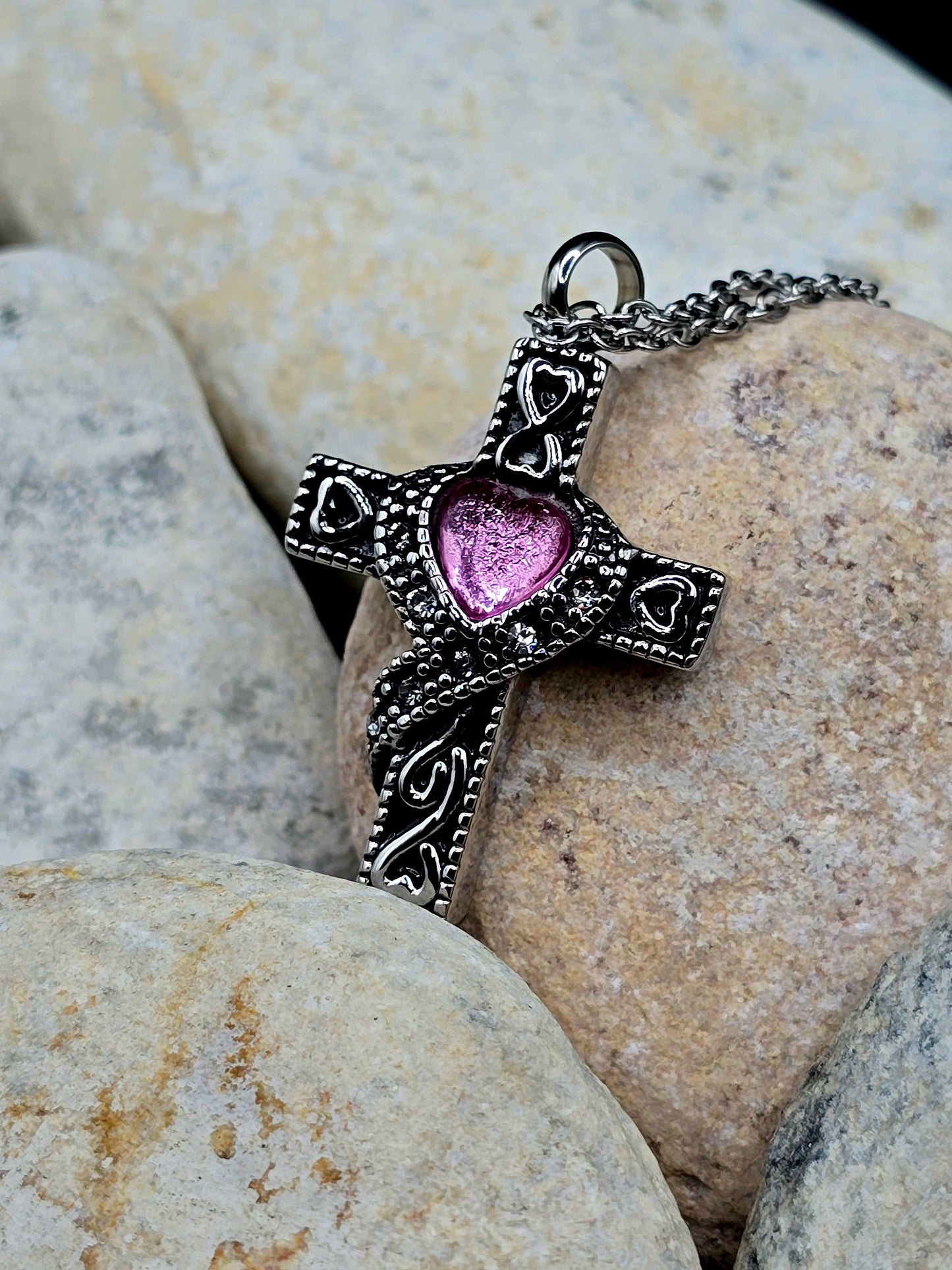 Stainless steel cross with purple stone