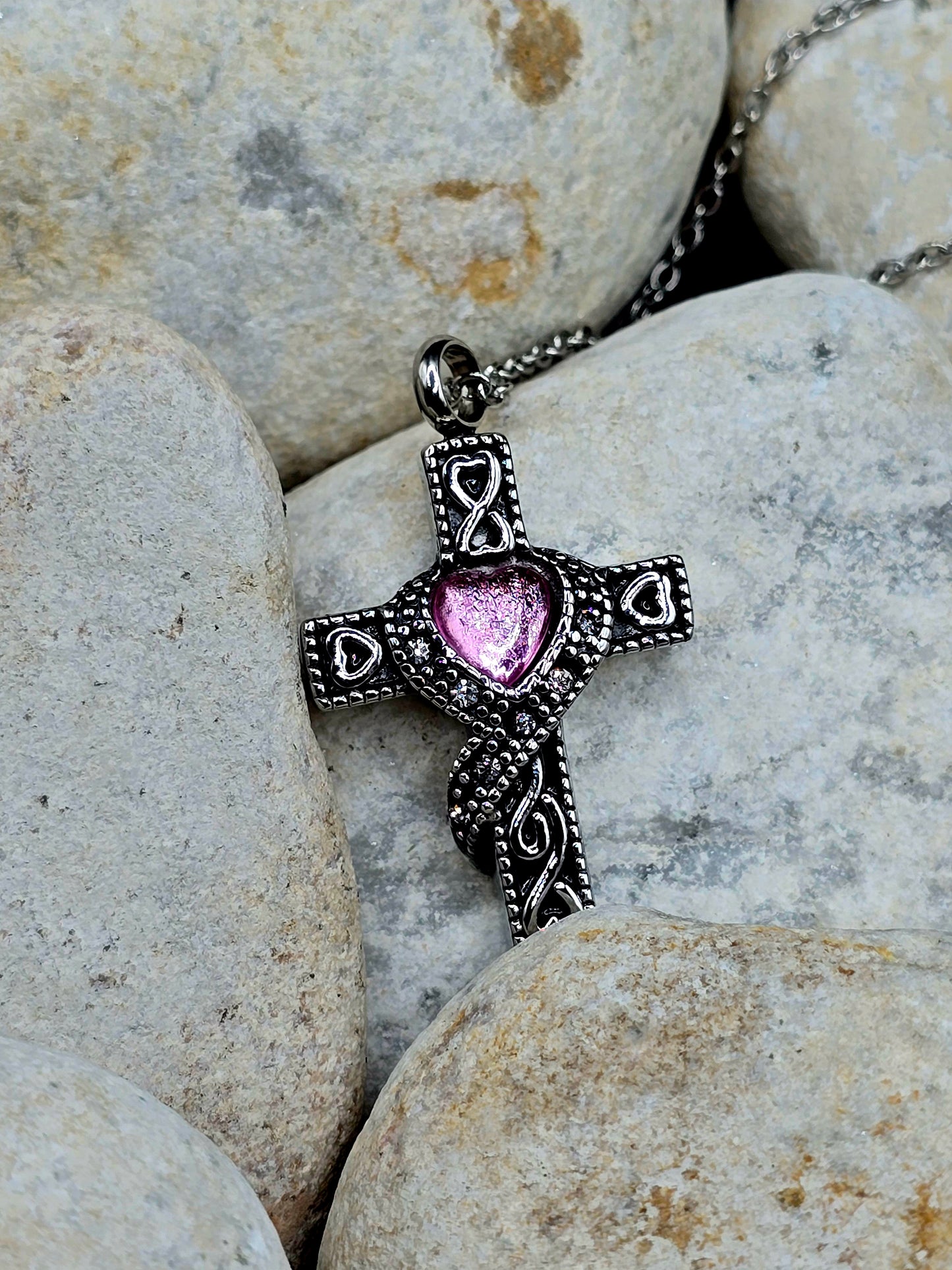 Stainless steel cross with purple stone