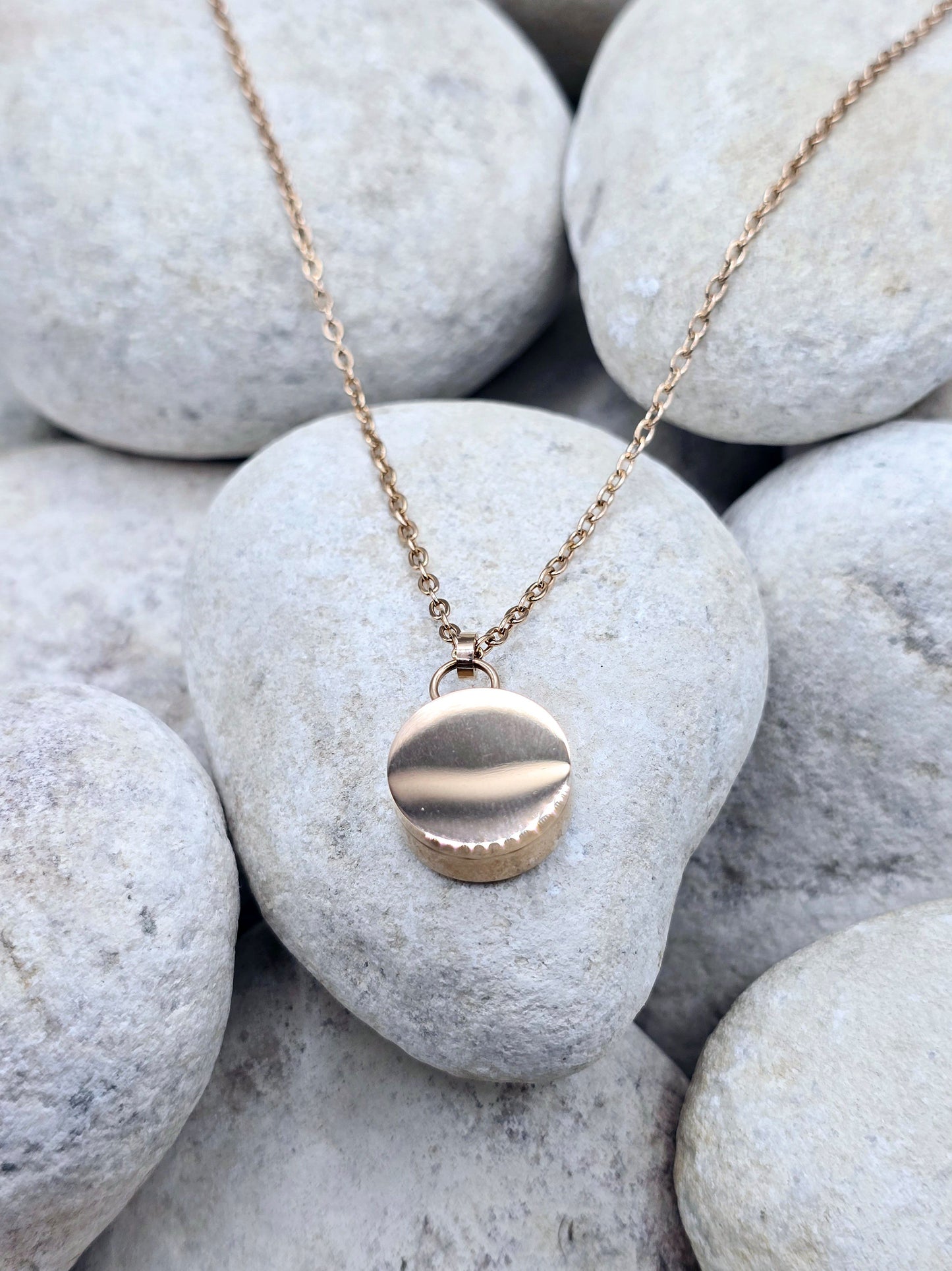 Stainless steel - plated rose gold urn necklace