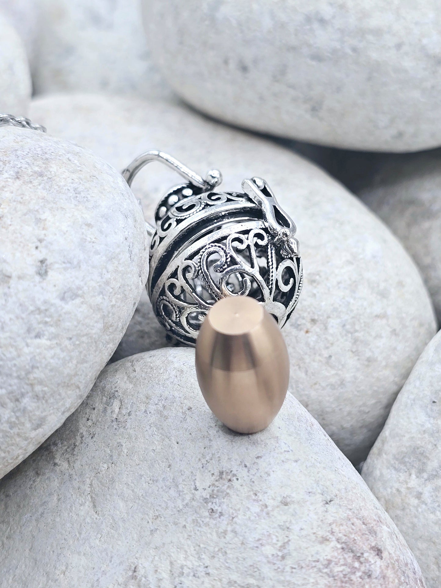 Detailed enclosed urn pendant and chain