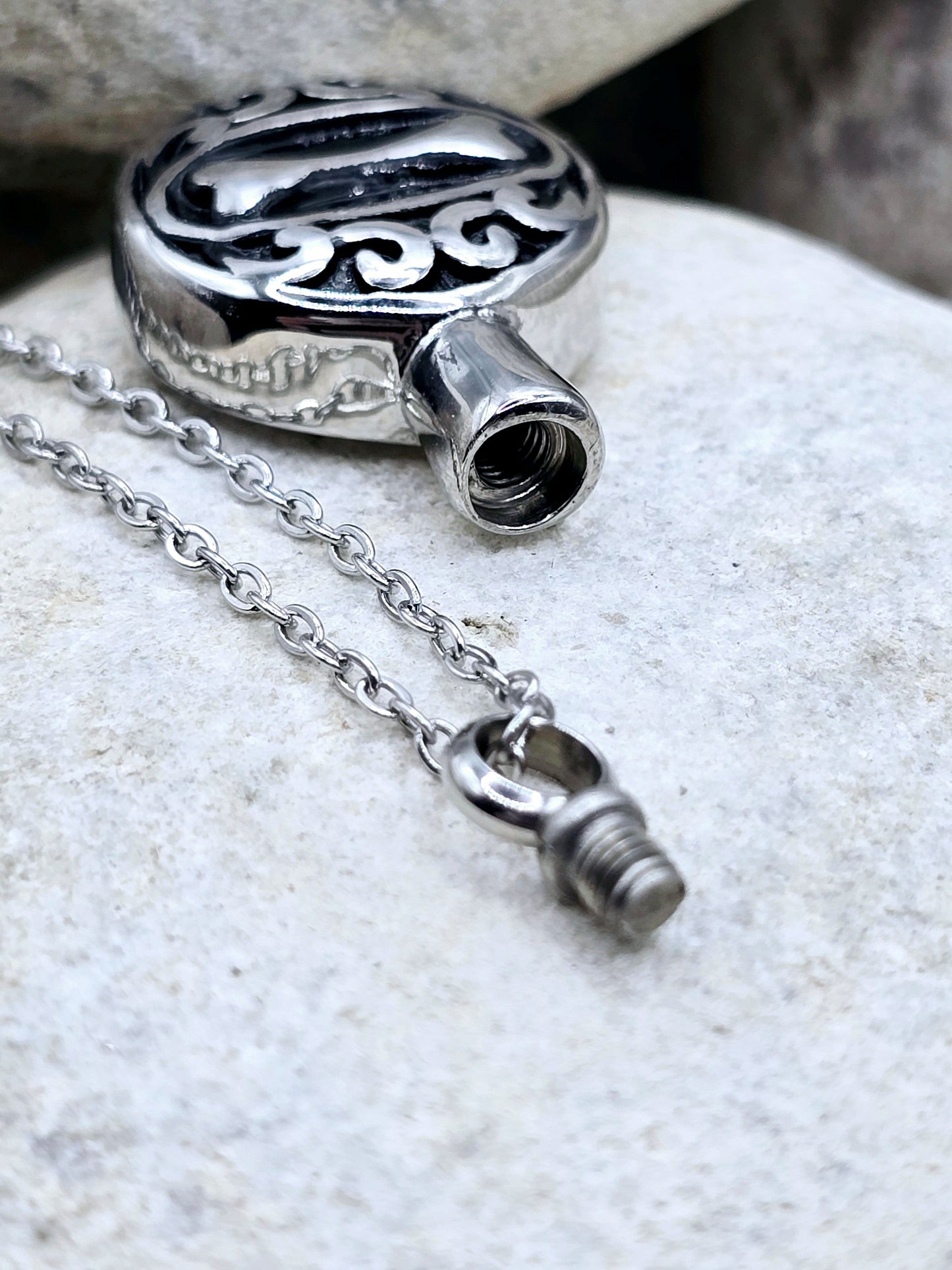 Round pendant with engraved dog bone necklace